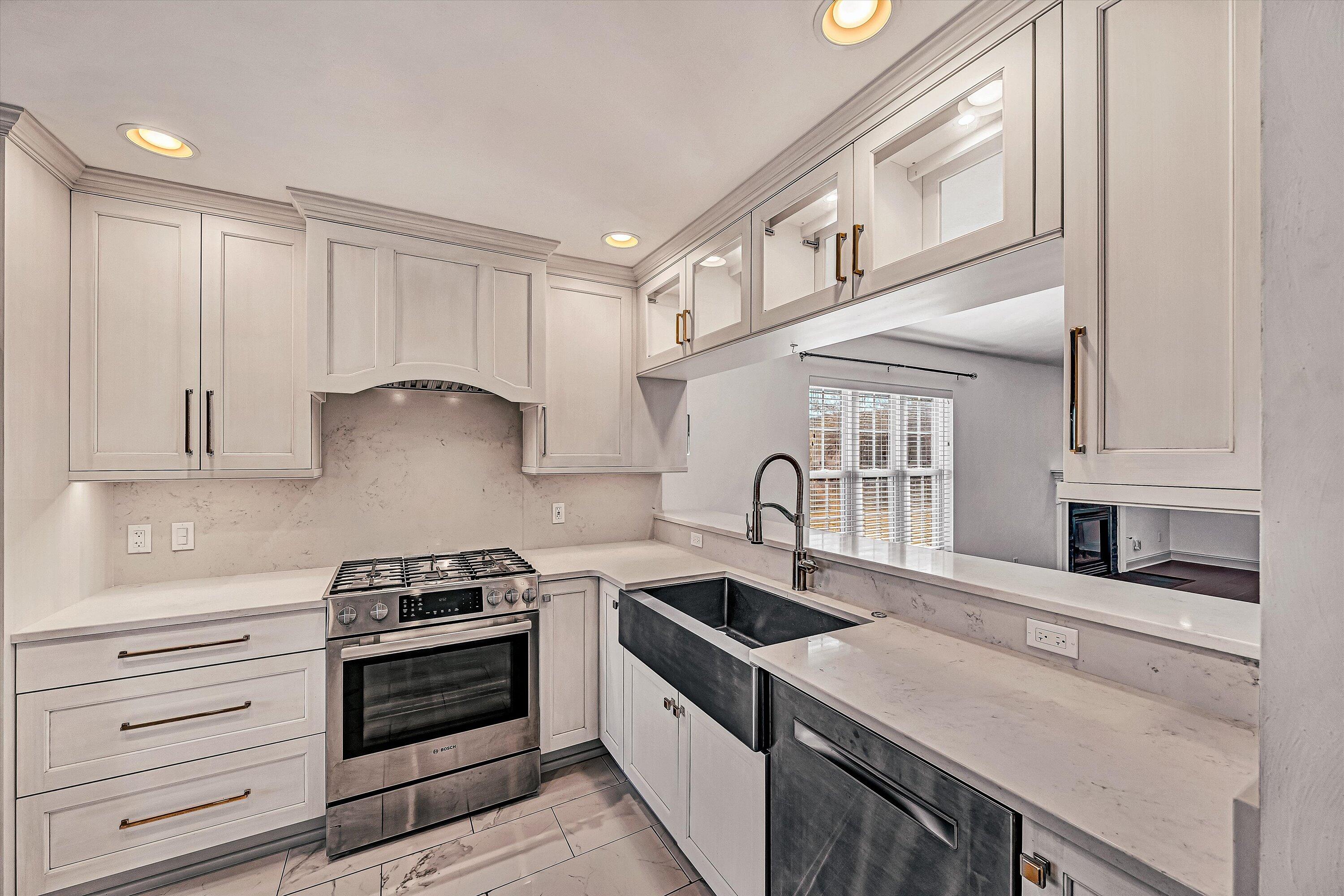 4530 Colonial Pl Drive Roanoke, VA 24018 - Photo 8 of 39 a kitchen with stainless steel appliances granite countertop a sink and a stove