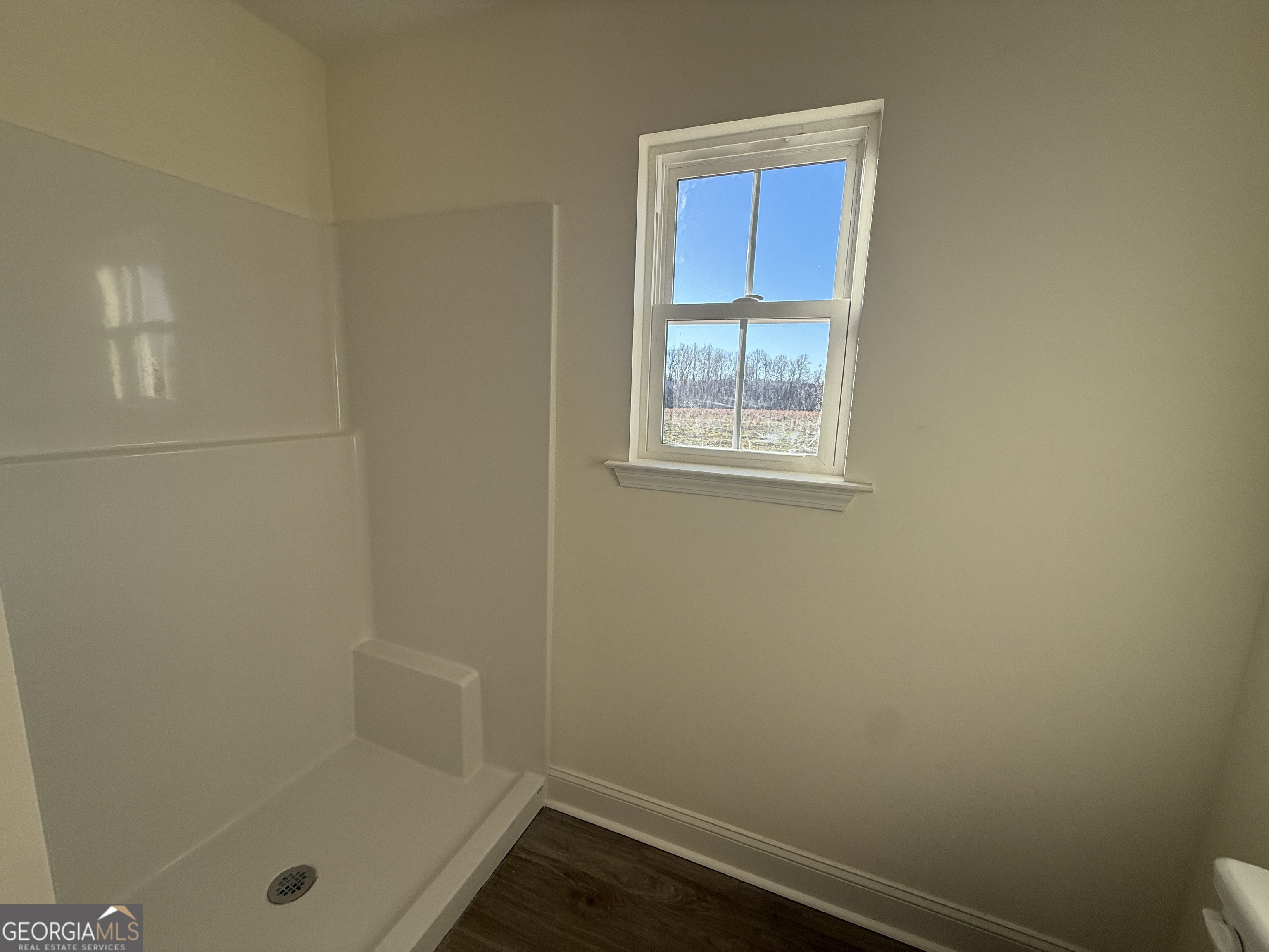 304 Womack Road South Portal, GA 30450 - Photo 14 of 19 a bathroom with a tub