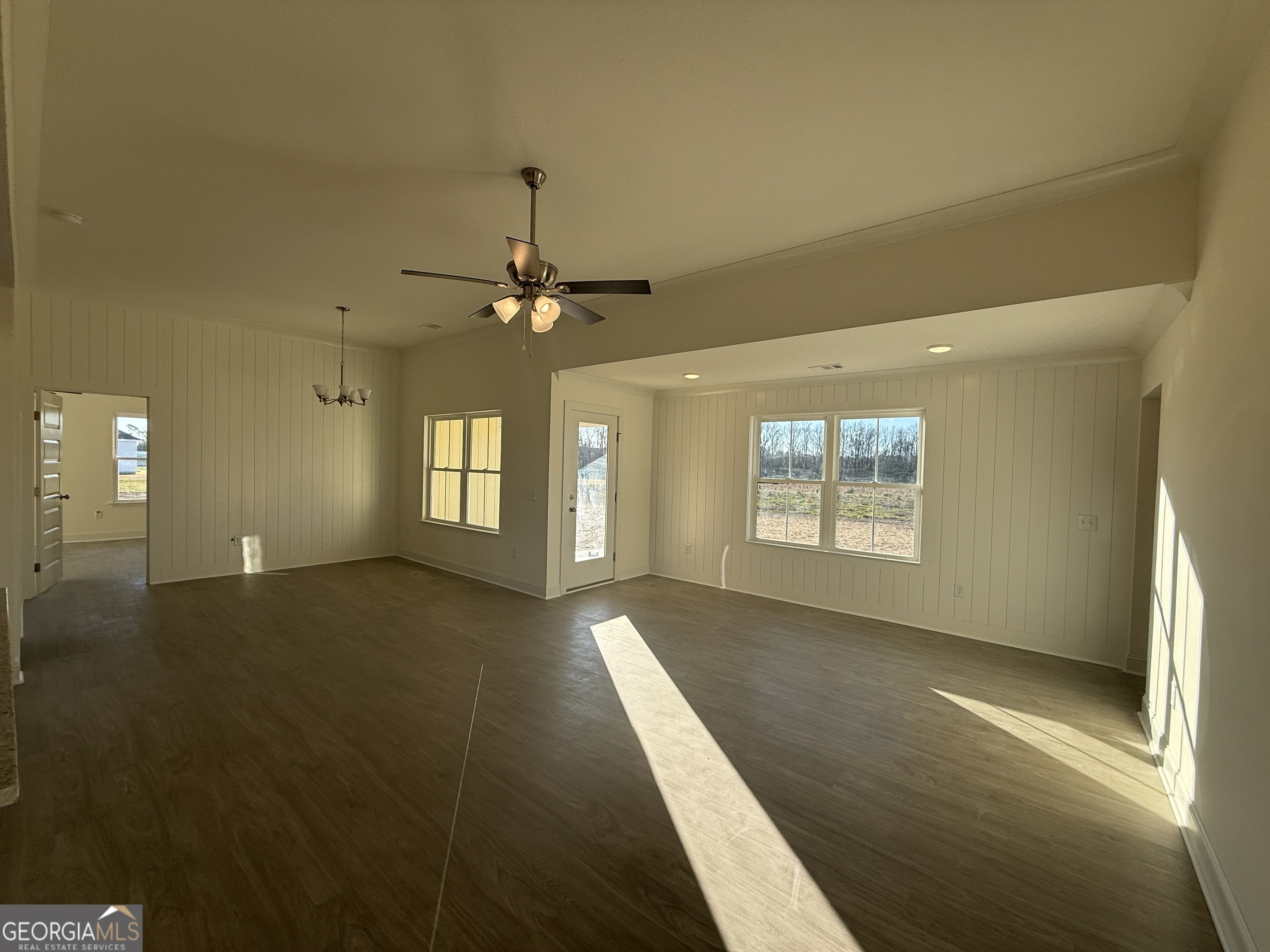 304 Womack Road South Portal, GA 30450 - Photo 3 of 19 a view of an empty room with a window