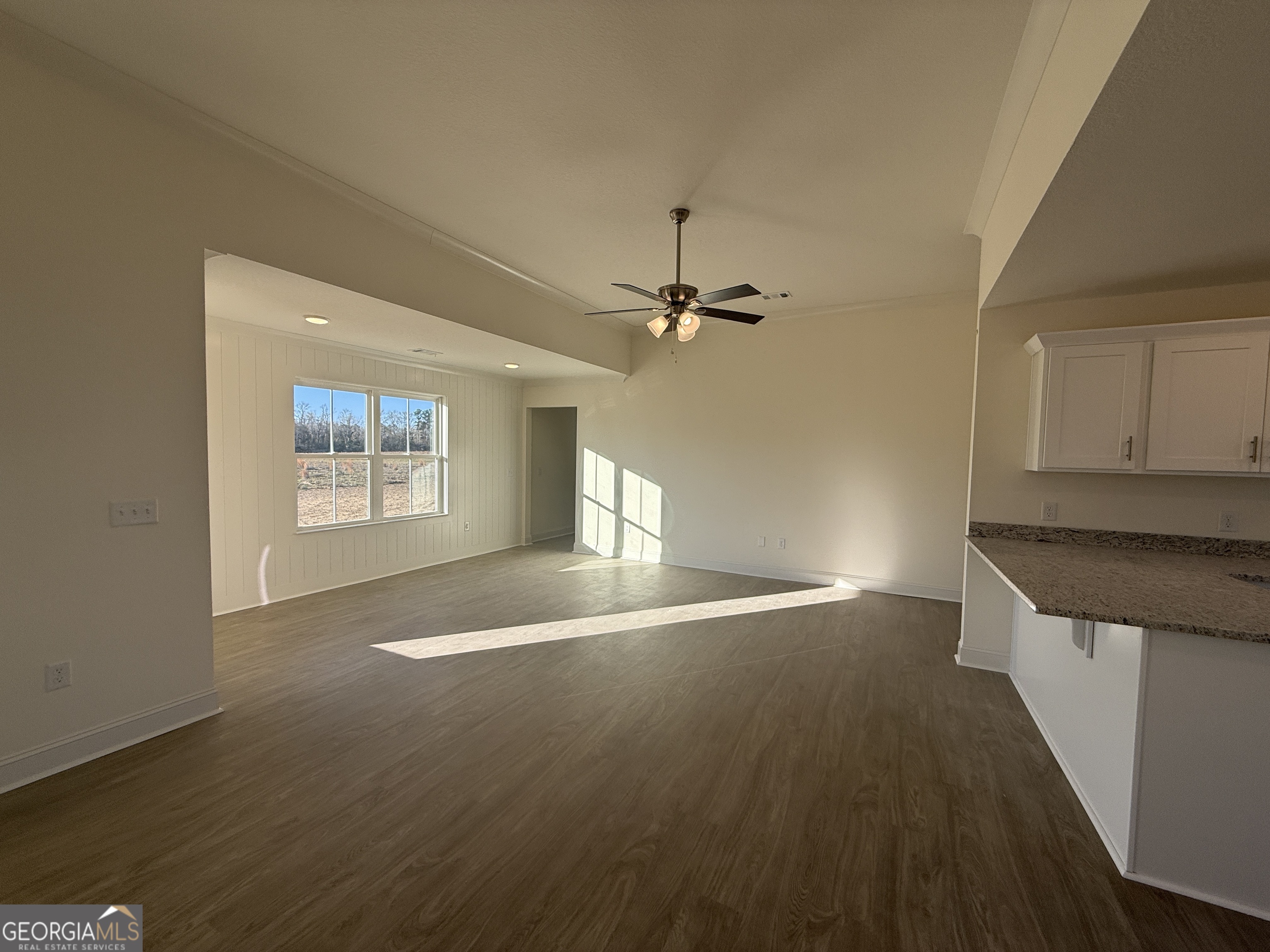 304 Womack Road South Portal, GA 30450 - Photo 4 of 19 a view of an empty room and window