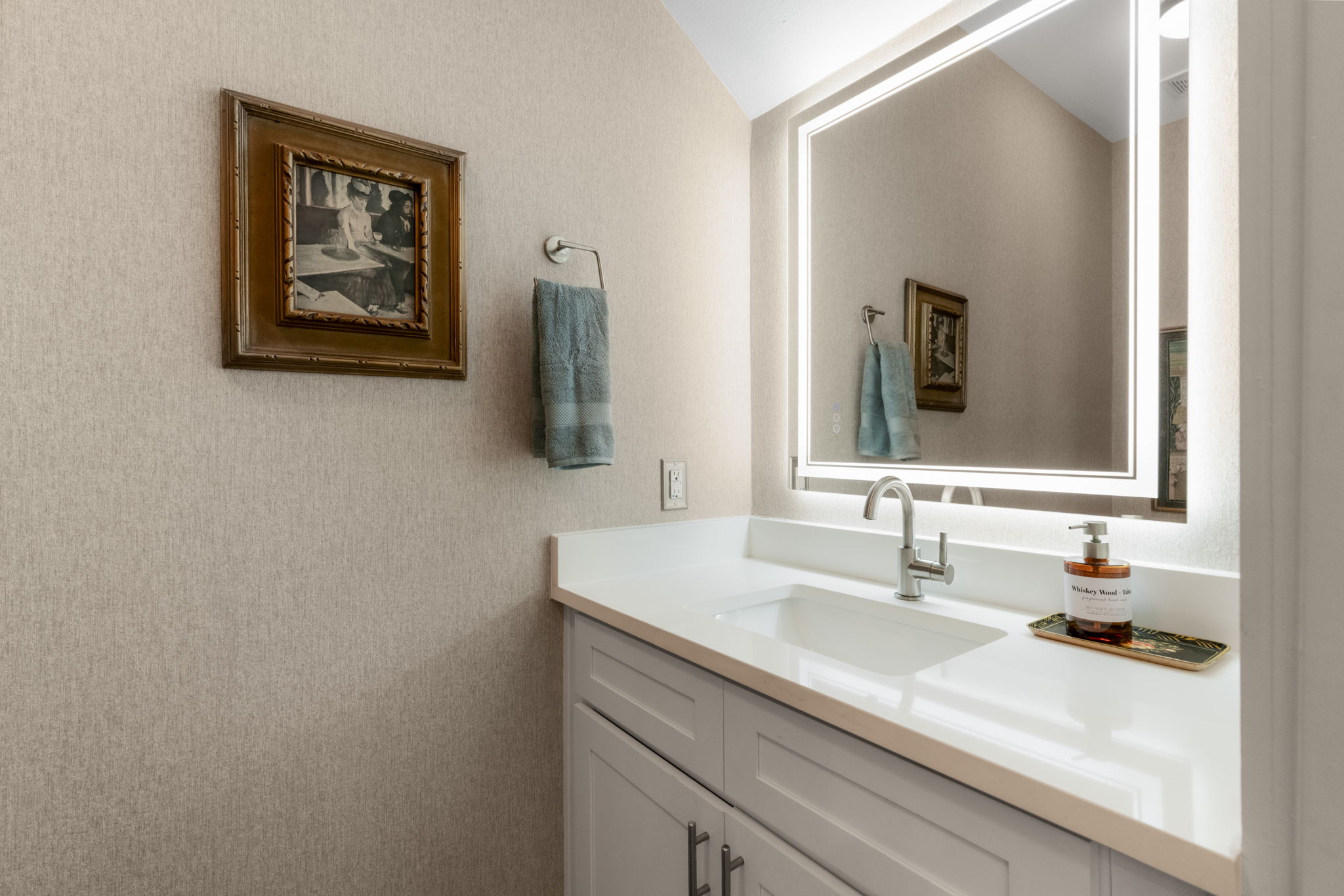 1148 Webberville Road, Unit 6 Austin, TX 78721 - Photo 15 of 34 a bathroom with a sink and a mirror
