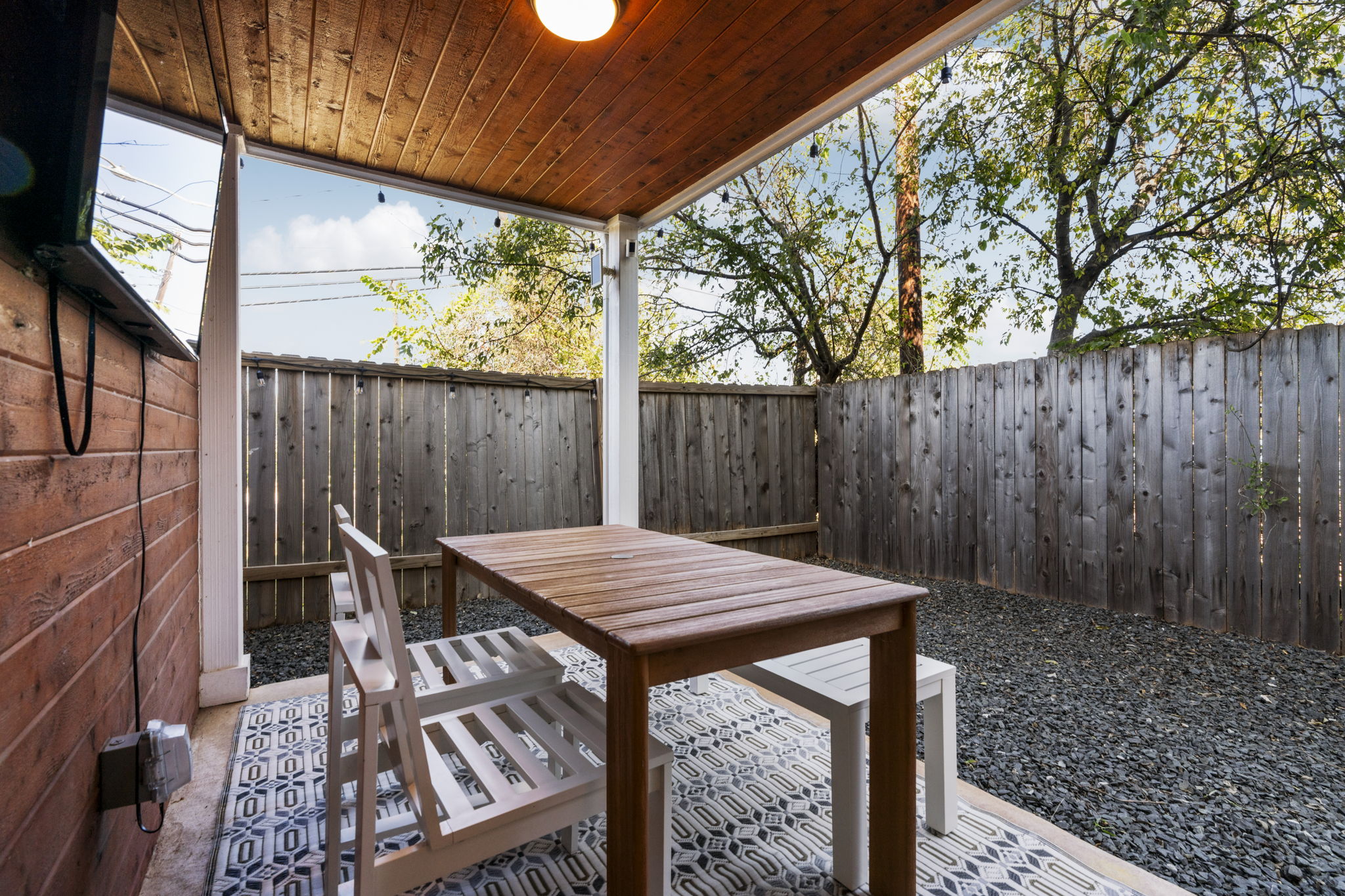1148 Webberville Road, Unit 6 Austin, TX 78721 - Photo 30 of 34 a view of an outdoor sitting area with furniture