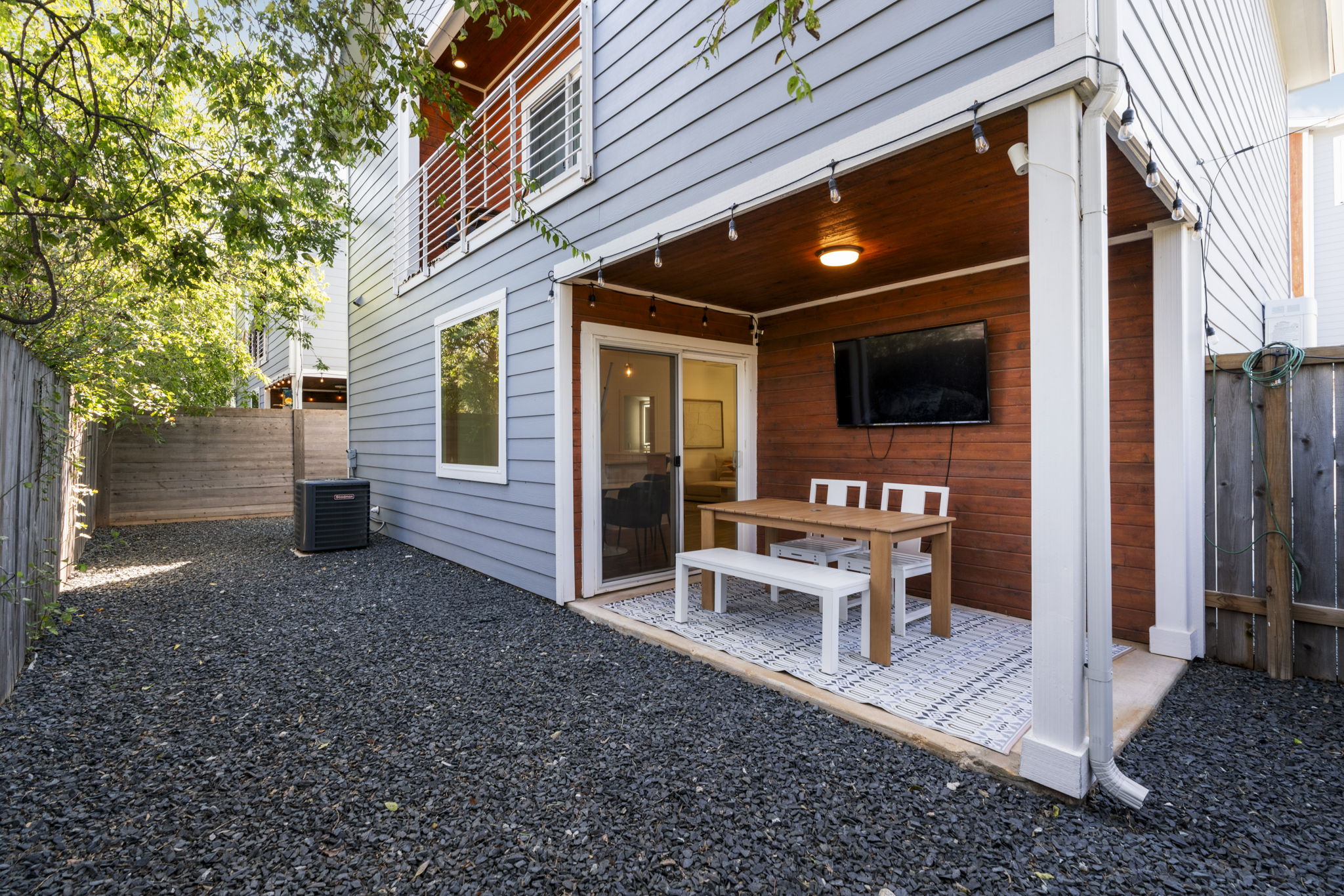 1148 Webberville Road, Unit 6 Austin, TX 78721 - Photo 32 of 34 a view of a porch with furniture