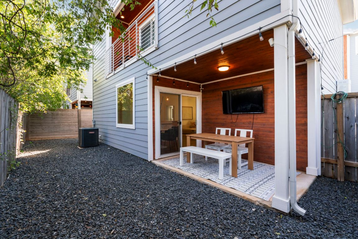 1148 Webberville Road, Unit 6 Austin, TX 78721 - Photo 32 of 34 a view of a porch with furniture