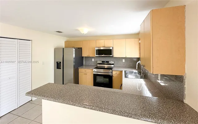 $349,900 | 14116 Southwest 260th Street, Unit 105, Homestead, FL 33032