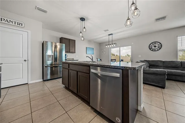 a view of a livingroom with furniture and window