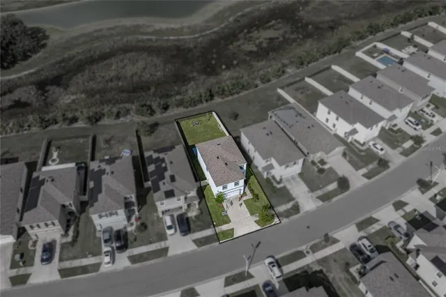 an aerial view of waterside residential houses