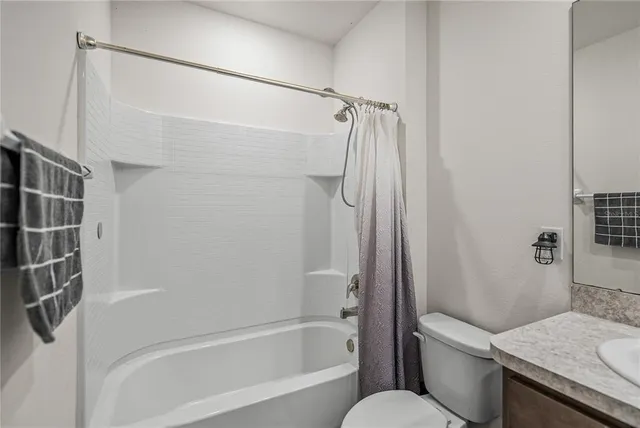 a view of house with outdoor space and sitting area