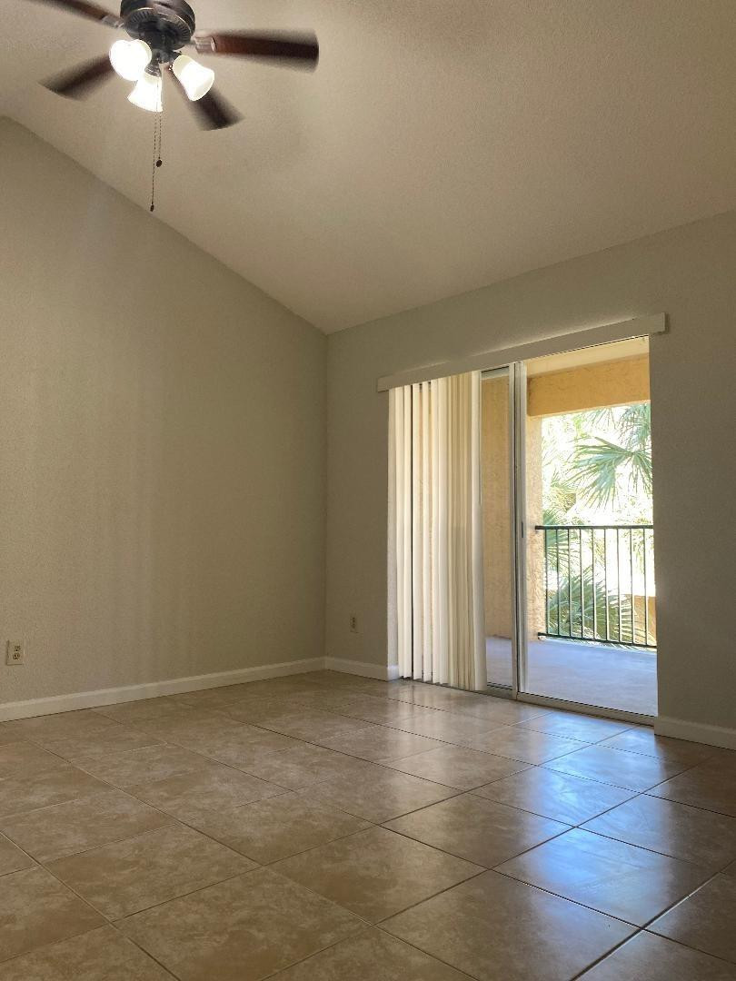 755 Riverside Drive, Unit 1337 Coral Springs, FL 33071 - Photo 1 of 37 a view of an empty room with a window