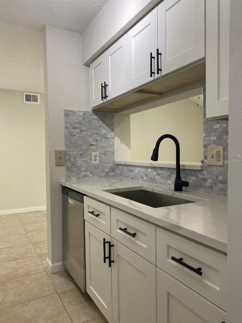755 Riverside Drive, Unit 1337 Coral Springs, FL 33071 - Photo 14 of 37 a close view of sink and tap