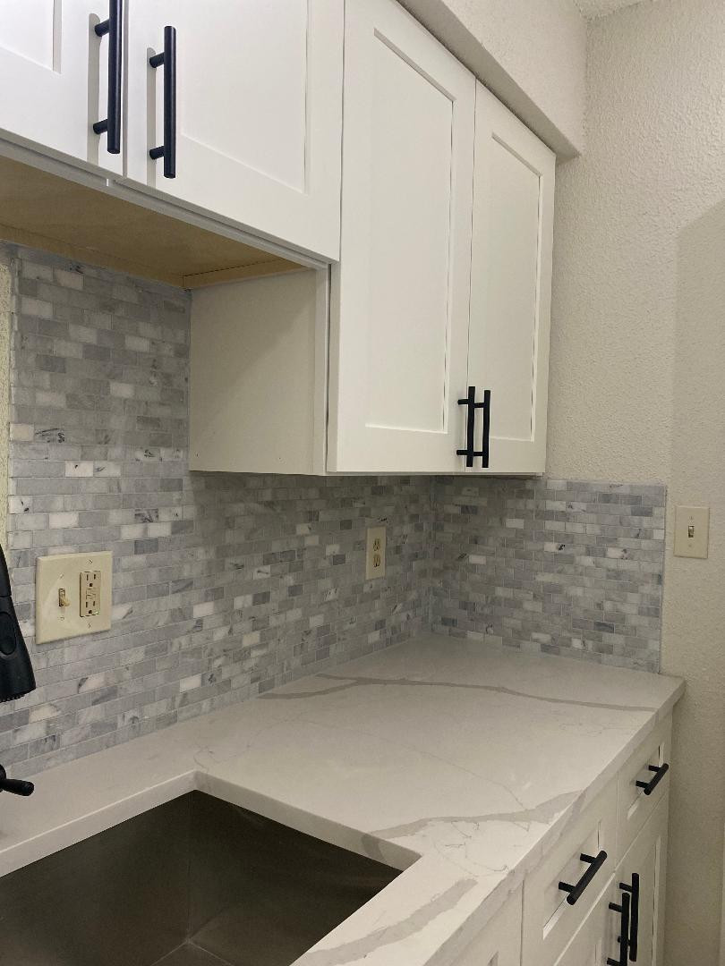 755 Riverside Drive, Unit 1337 Coral Springs, FL 33071 - Photo 15 of 37 a kitchen with a sink and cabinets