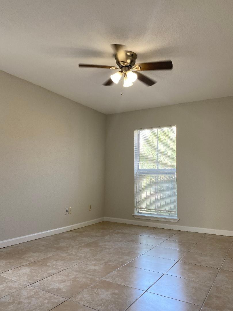 755 Riverside Drive, Unit 1337 Coral Springs, FL 33071 - Photo 21 of 37 a view of an empty room with a window
