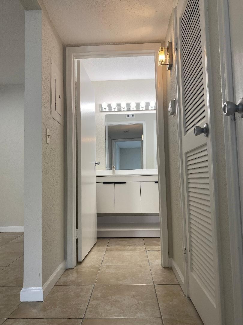 755 Riverside Drive, Unit 1337 Coral Springs, FL 33071 - Photo 27 of 37 a view of a utility room with washer and dryer
