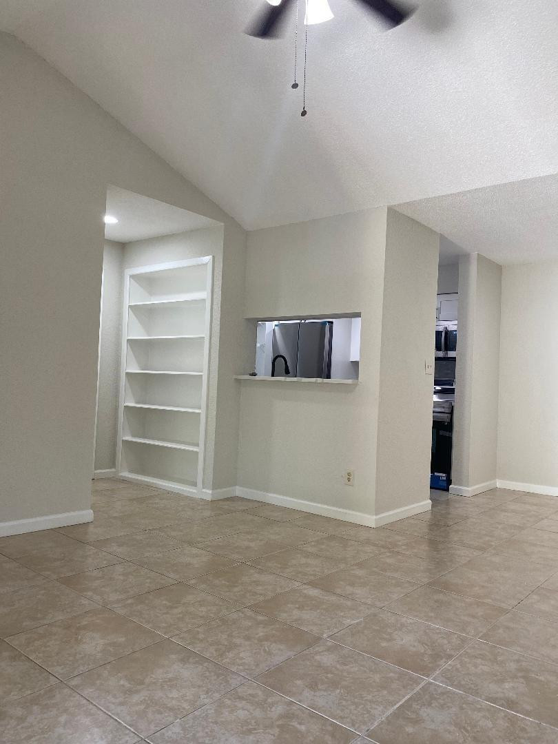 755 Riverside Drive, Unit 1337 Coral Springs, FL 33071 - Photo 6 of 37 a view of room with a ceiling fan