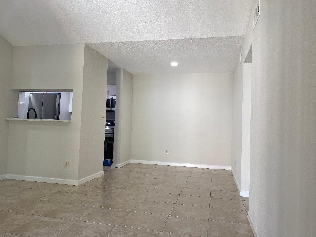 755 Riverside Drive, Unit 1337 Coral Springs, FL 33071 - Photo 7 of 37 a view of an empty room
