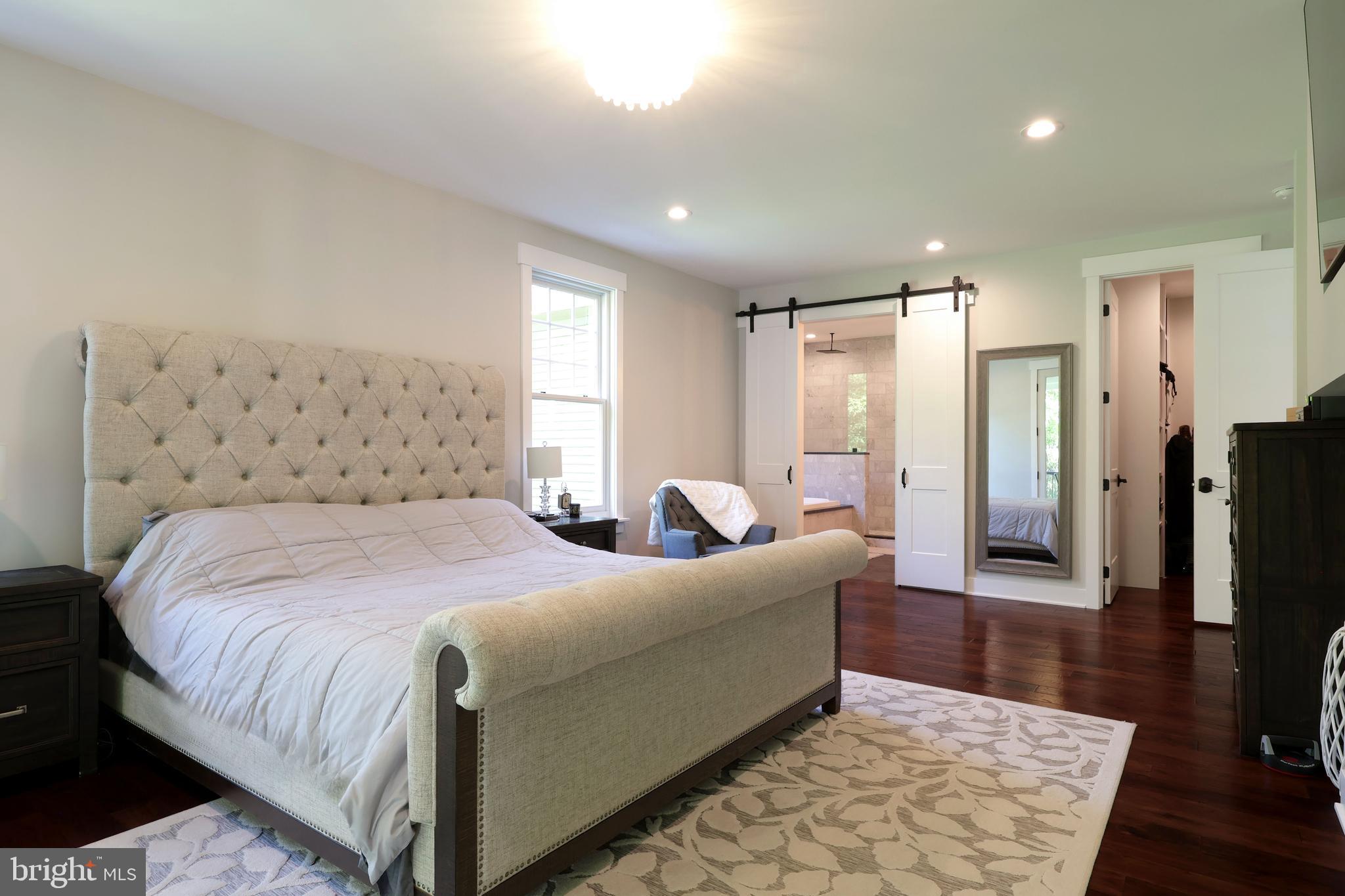 518 Two Mile Road Howard, PA 16841 - Photo 31 of 84 a bedroom with a large bed and a couch