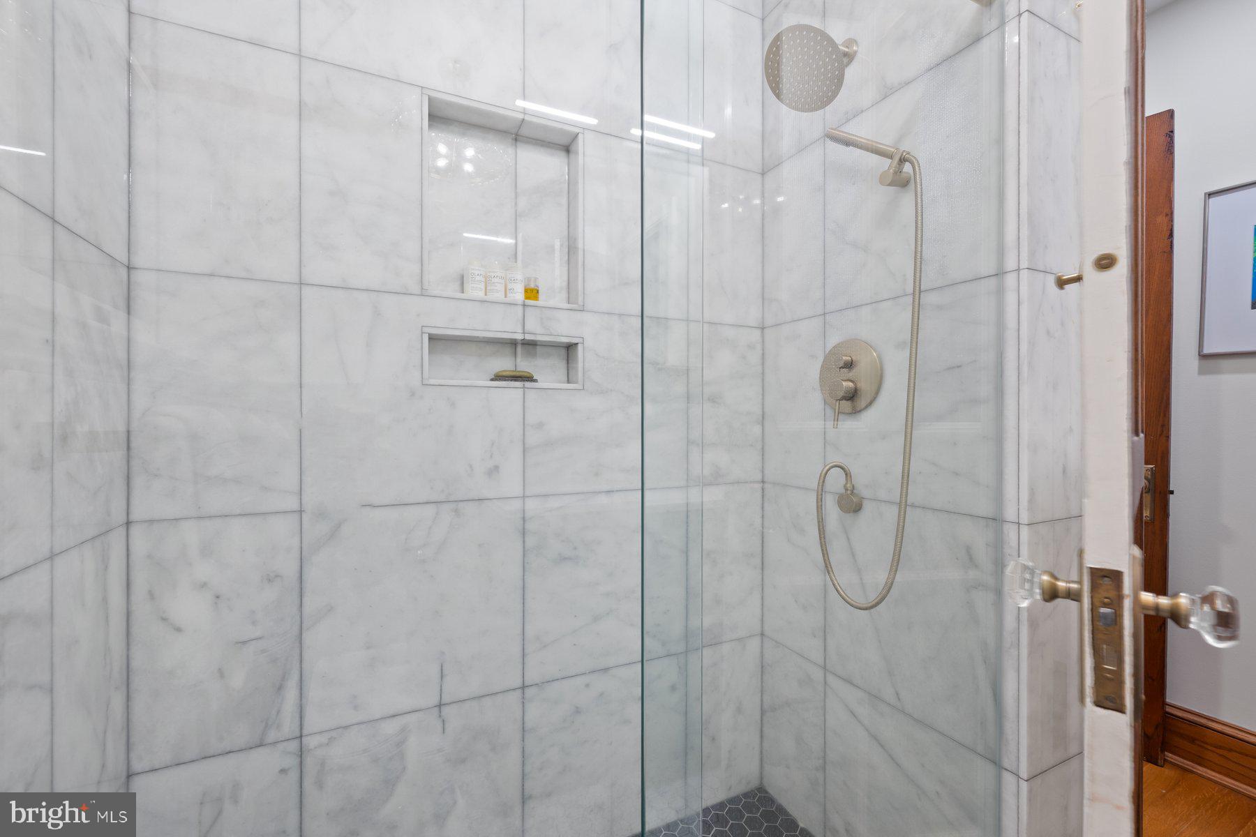 3020 Dent Place Northwest, Unit 30W Washington, DC 20007 - Photo 24 of 37 a bathroom with a shower
