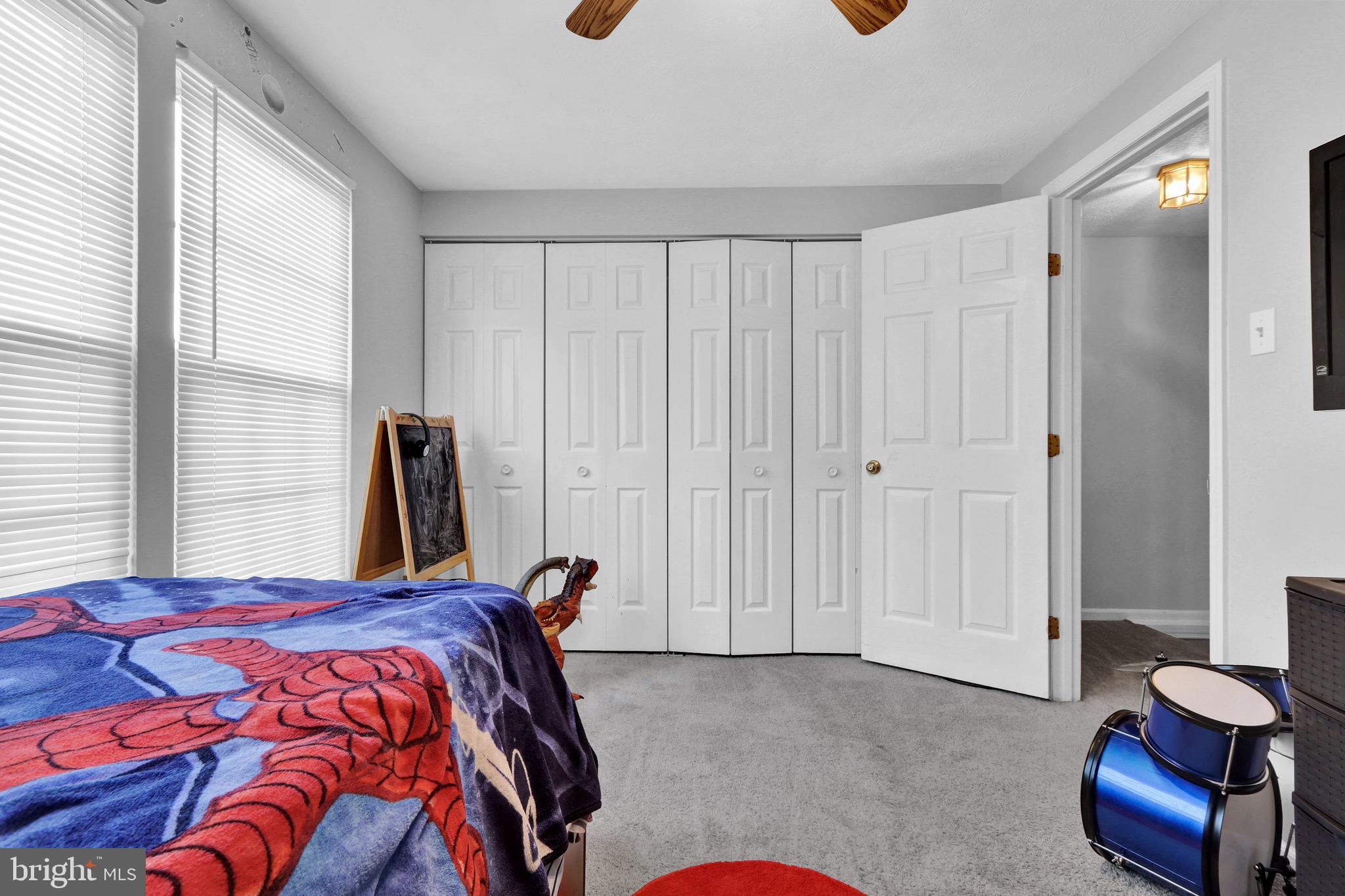2235 Riding Crop Way Windsor Mill, MD 21244 - Photo 11 of 29 a bed room with a bed and a chair