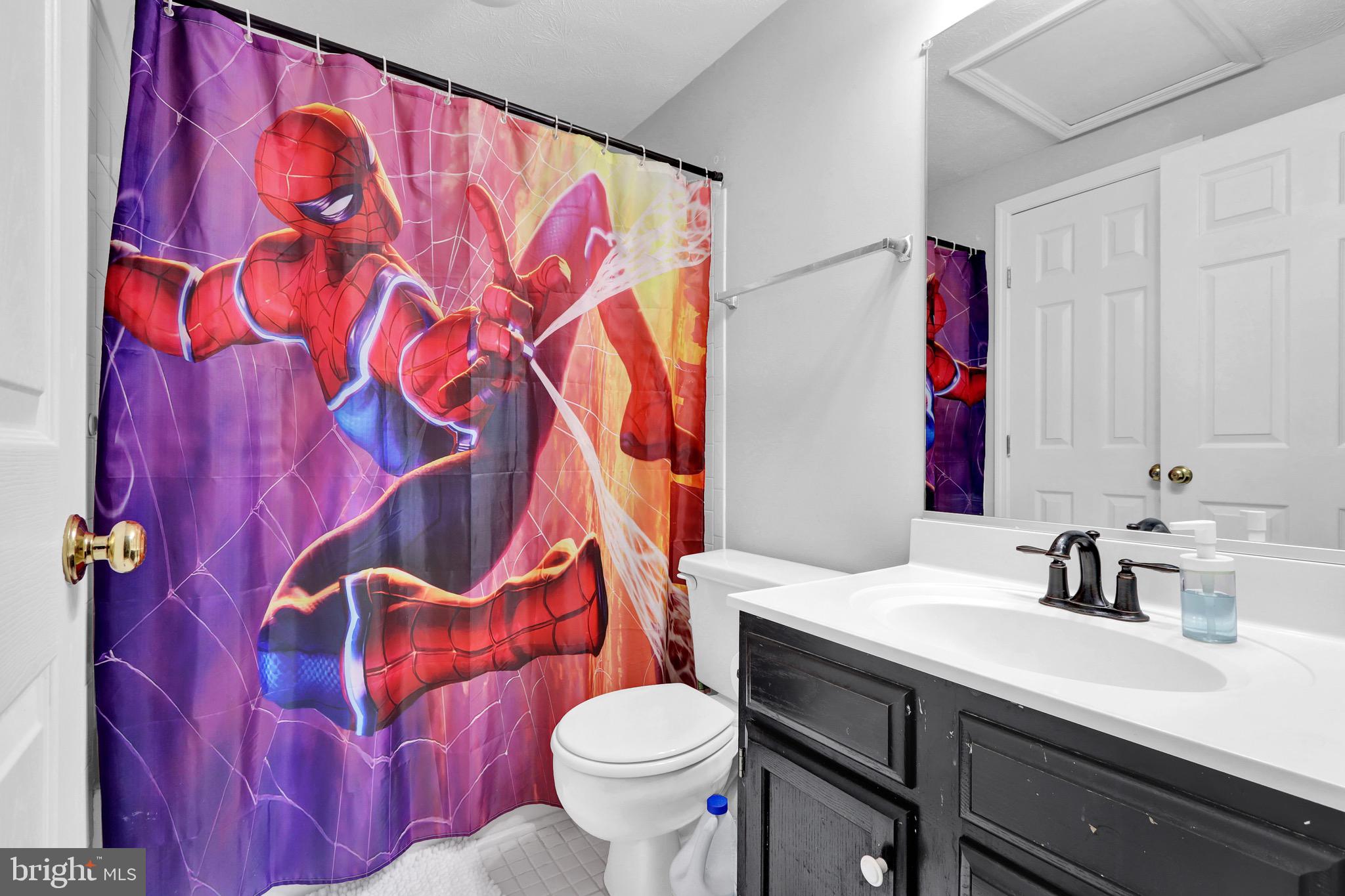 2235 Riding Crop Way Windsor Mill, MD 21244 - Photo 12 of 29 a bathroom with a sink and toilet