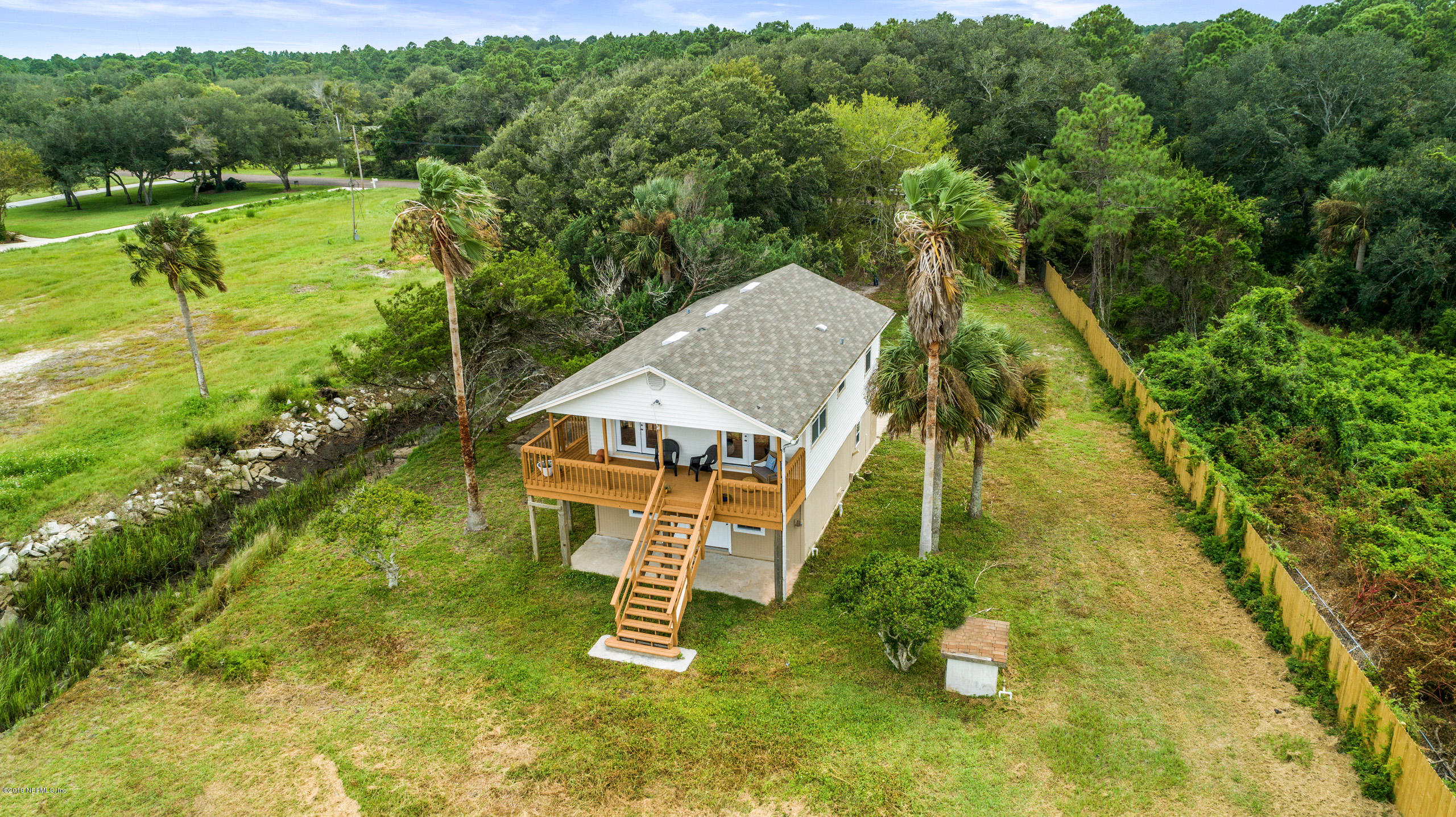 16147 Shellcracker Road Jacksonville, FL 32226 - Photo 53 of 58 a aerial view of a house with a yard