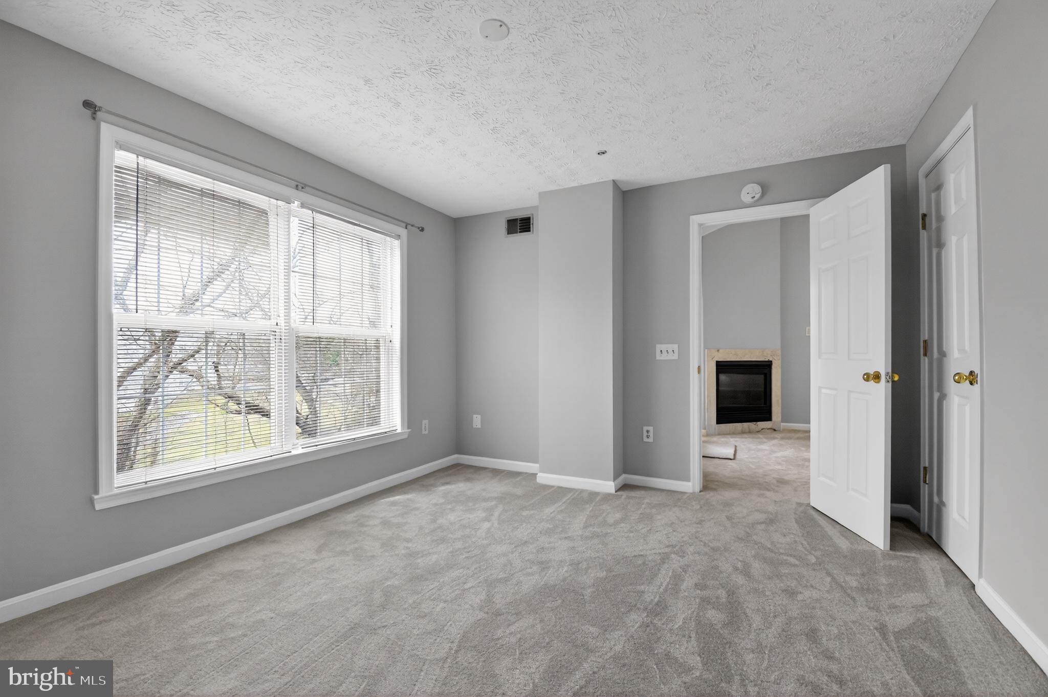 2058 Quaker Way, Unit 12 Annapolis, MD 21401 - Photo 15 of 27 a view of an empty room with a window