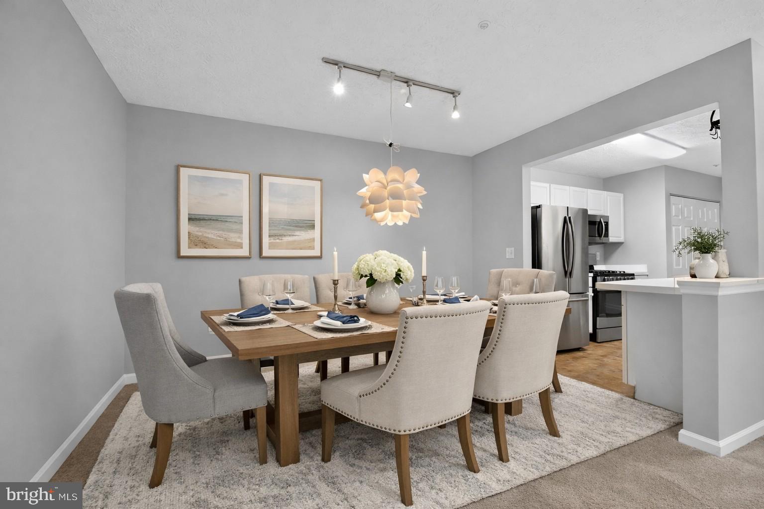2058 Quaker Way, Unit 12 Annapolis, MD 21401 - Photo 21 of 27 a dining room with furniture and window