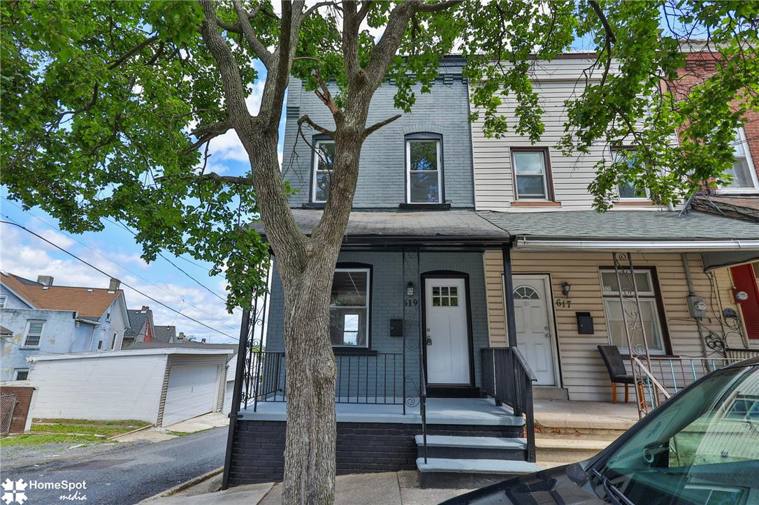 619 Sioux Street Bethlehem, PA 18015 - Photo 1 of 61 a front view of a house with a tree