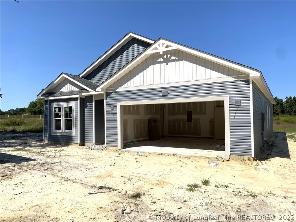 601 Laurel Lake Road Salemburg, NC 28385 - Photo 1 of 17 a front view of a house