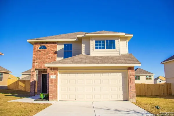 a front view of a house with a space