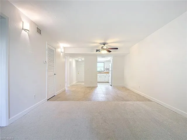 a view of a livingroom with a ceiling fan