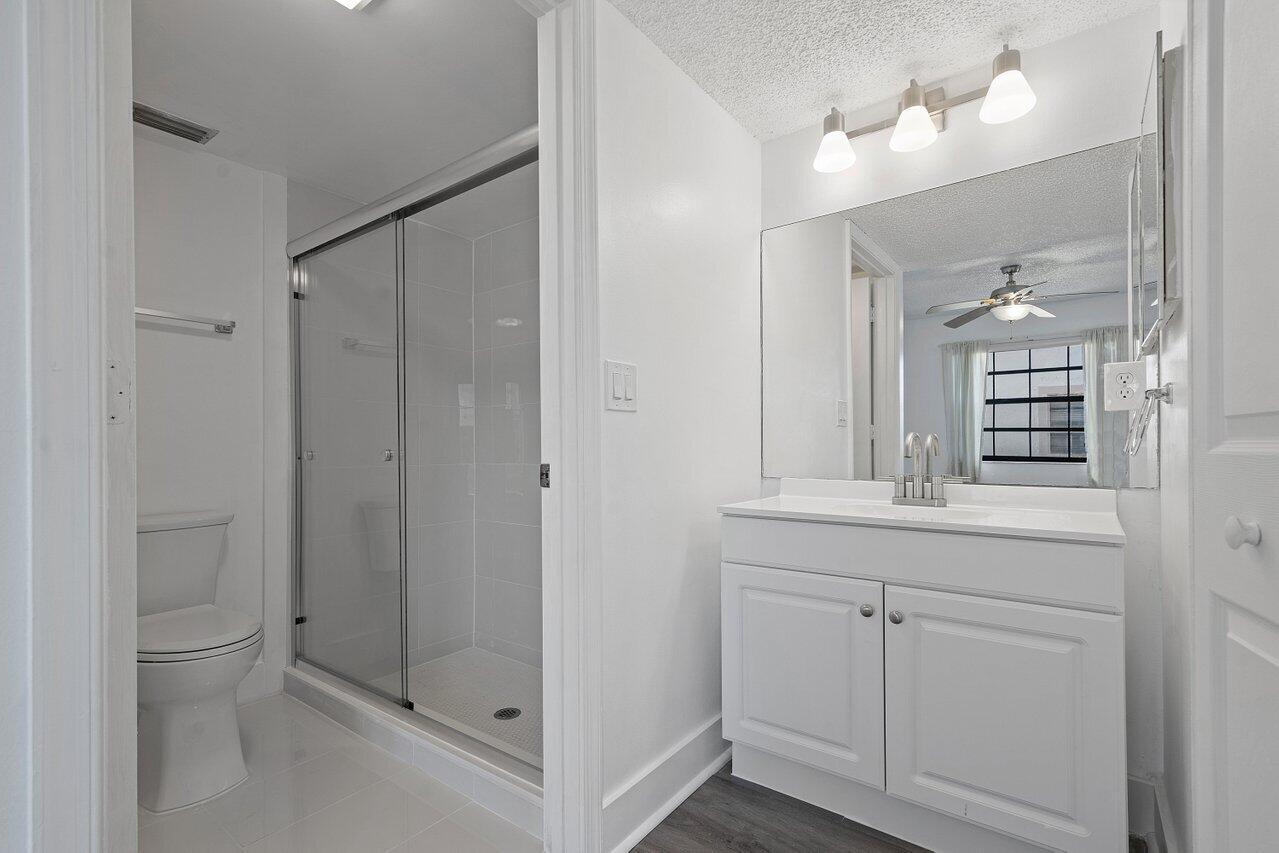 3190 Leewood Terrace, Unit L104 Boca Raton, FL 33431 - Photo 12 of 24 Primary bath