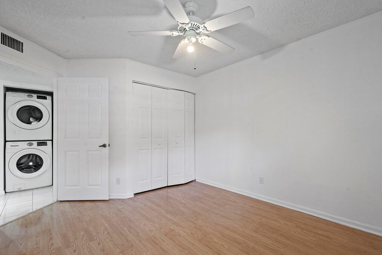3190 Leewood Terrace, Unit L104 Boca Raton, FL 33431 - Photo 14 of 24 into hall