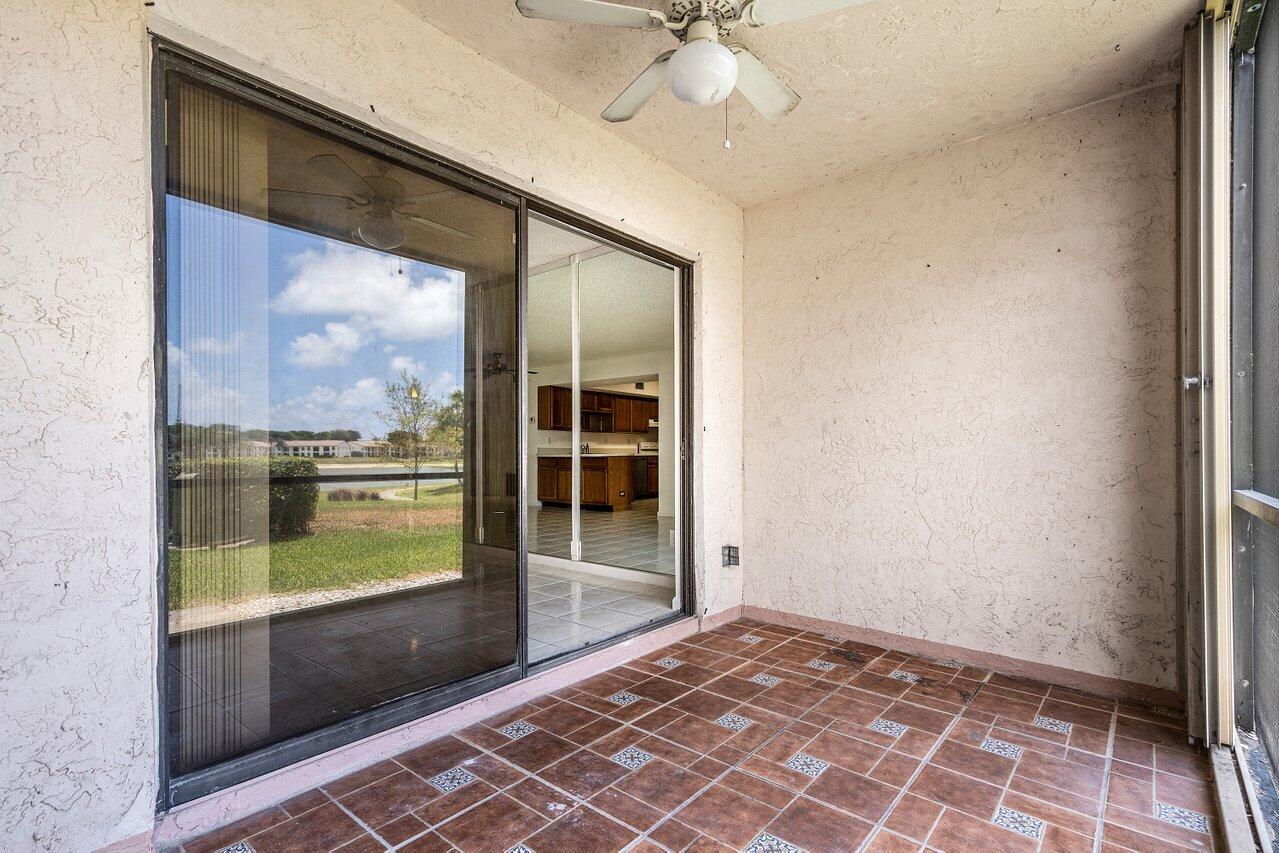 3190 Leewood Terrace, Unit L104 Boca Raton, FL 33431 - Photo 19 of 24 Screened patio