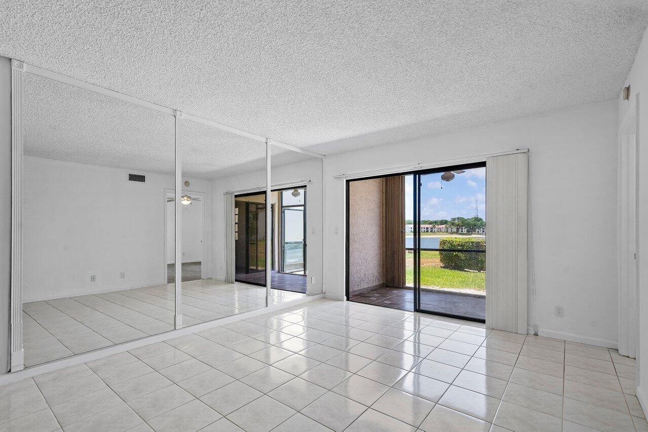3190 Leewood Terrace, Unit L104 Boca Raton, FL 33431 - Photo 7 of 24 Lake view