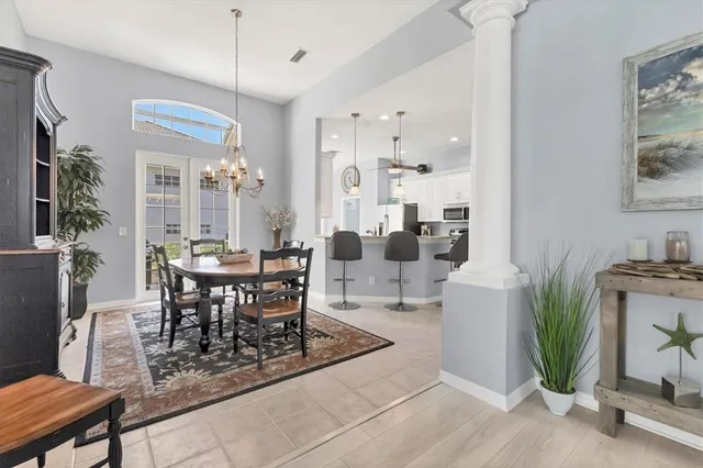 a view of a dining room with furniture