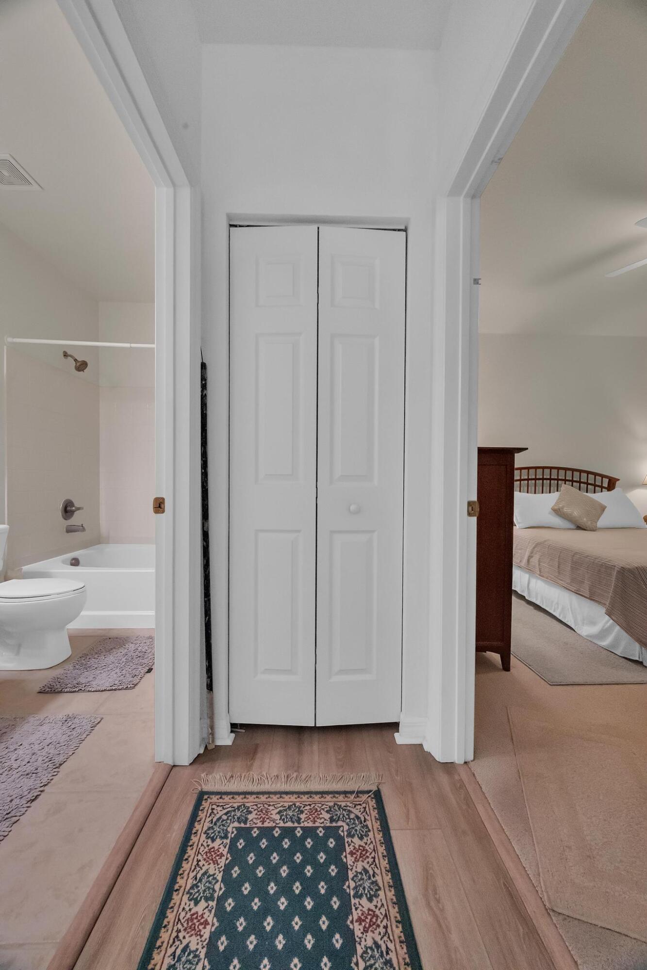 367 Southeast Rogers Court Stuart, FL 34994 - Photo 13 of 35 a bathroom with a bathtub and a shower