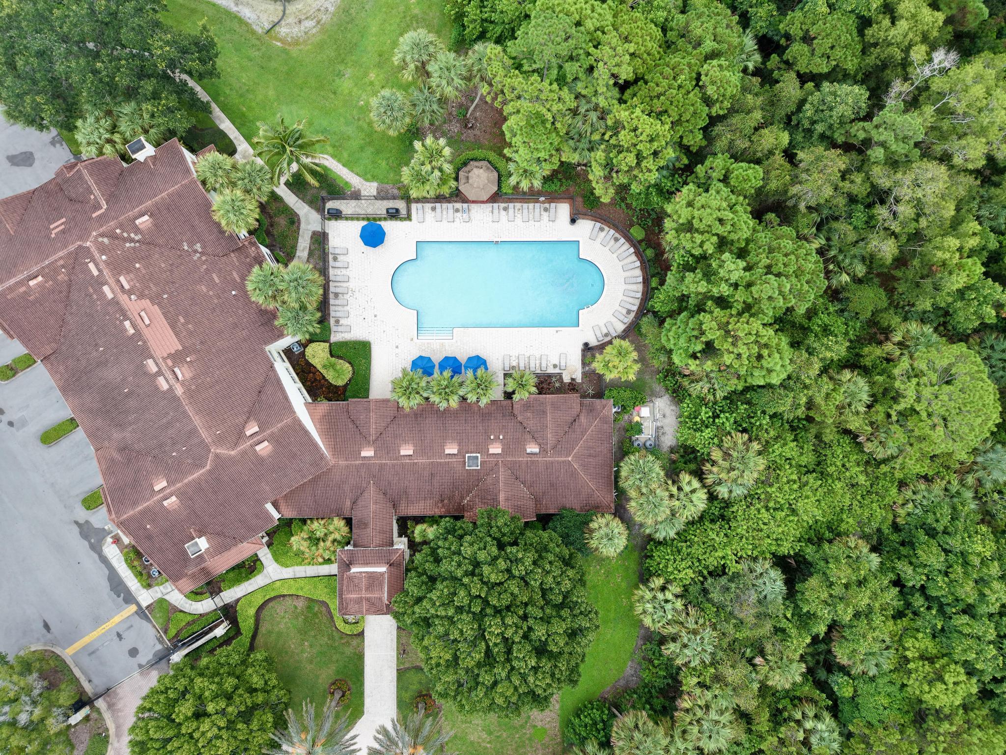 367 Southeast Rogers Court Stuart, FL 34994 - Photo 27 of 35 an aerial view of a house with a yard and a large tree