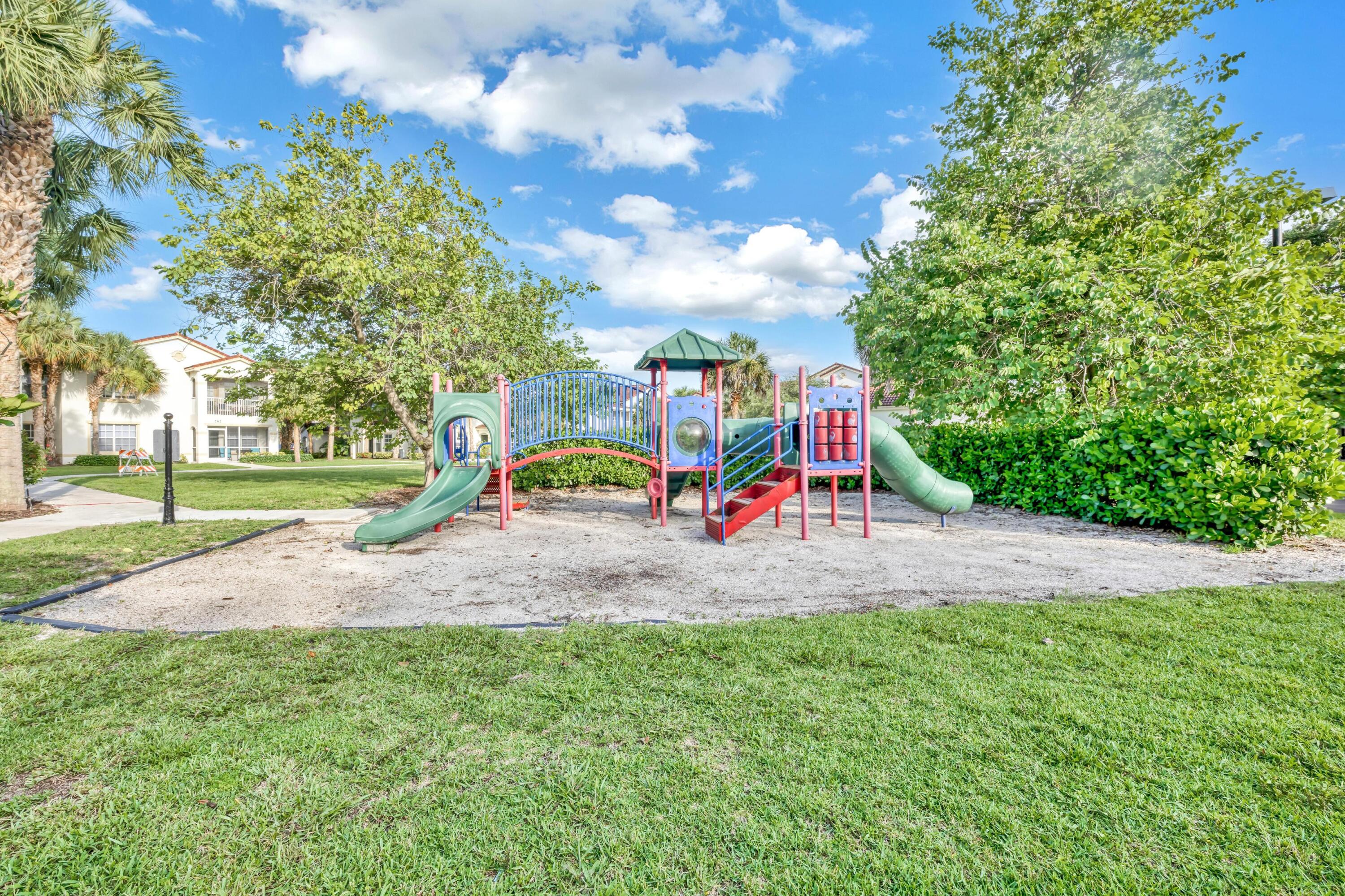 367 Southeast Rogers Court Stuart, FL 34994 - Photo 28 of 35 a view of outdoor space with playground and green space