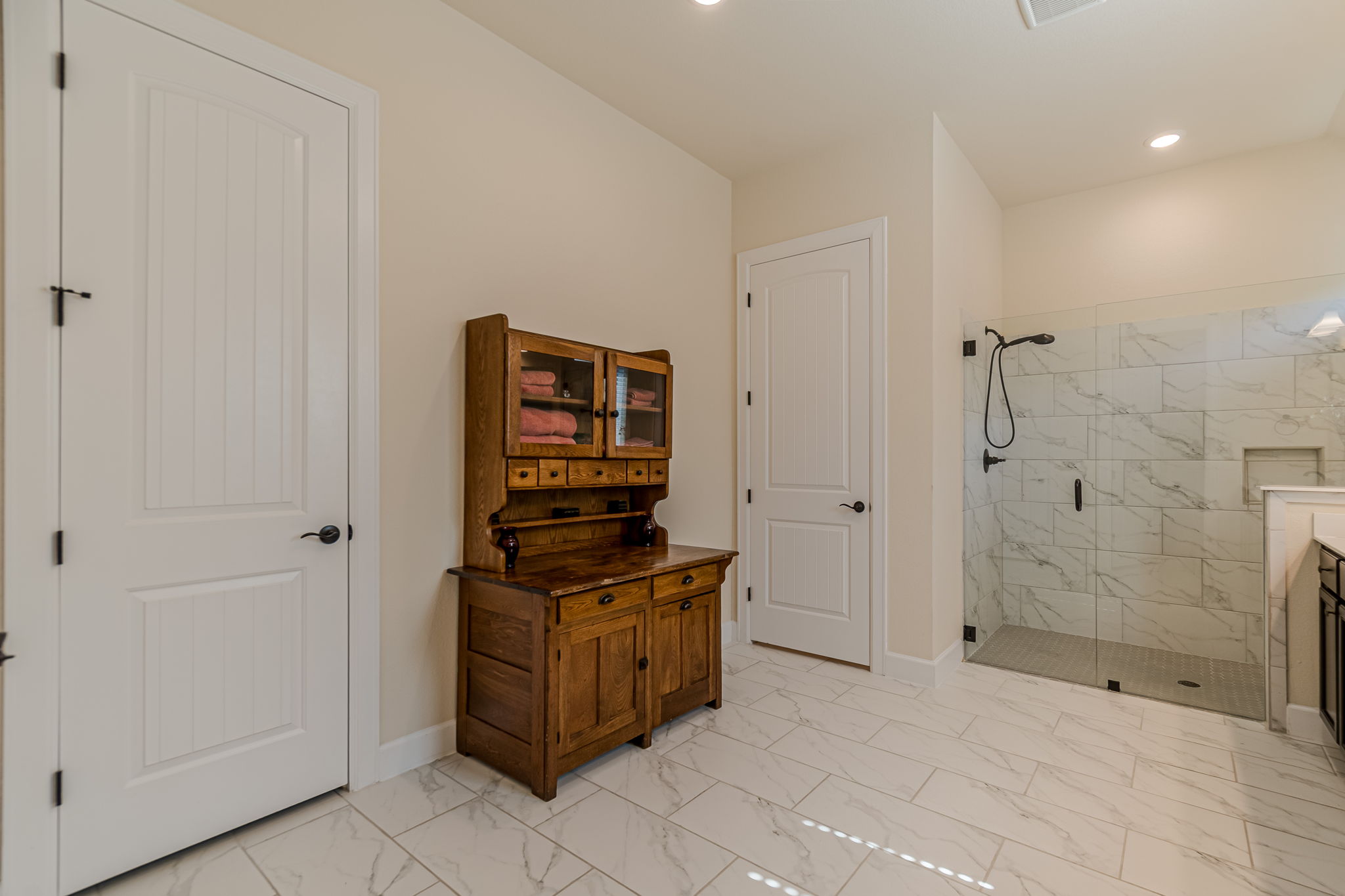 136 Calming Agave Way San Marcos, TX 78666 - Photo 30 of 40 a view of a bathroom with shower