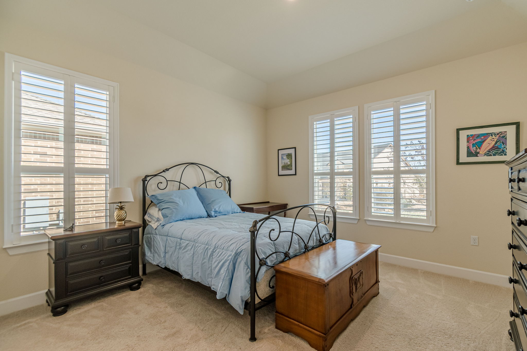 136 Calming Agave Way San Marcos, TX 78666 - Photo 32 of 40 a bedroom with a bed couch and a window