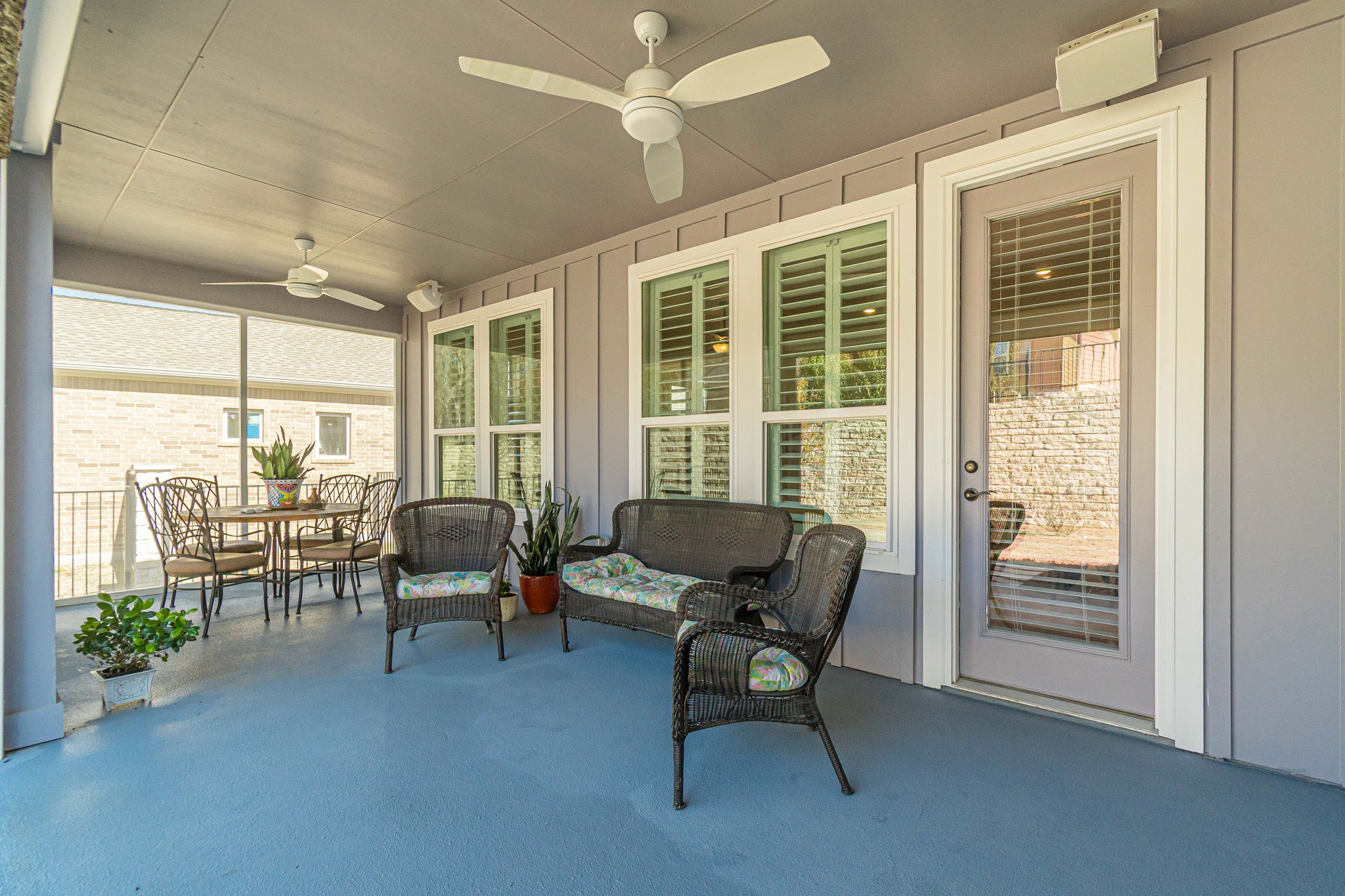 136 Calming Agave Way San Marcos, TX 78666 - Photo 33 of 40 a living room with furniture and a floor to ceiling window