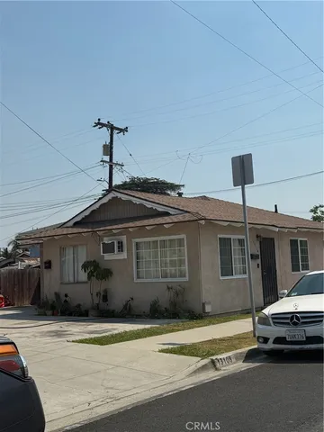 a car parked in front of a house
