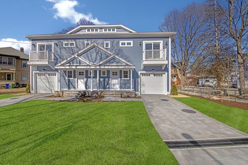 a front view of a house with yard porch and livingroom