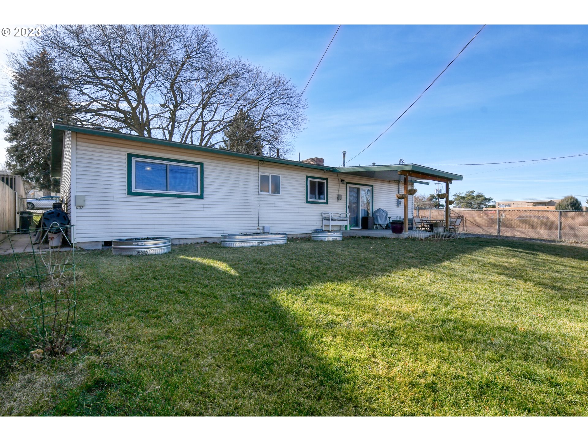 2437 Southwest Ladow Avenue Pendleton, OR 97801 - Photo 25 of 32 a view of a house with a yard