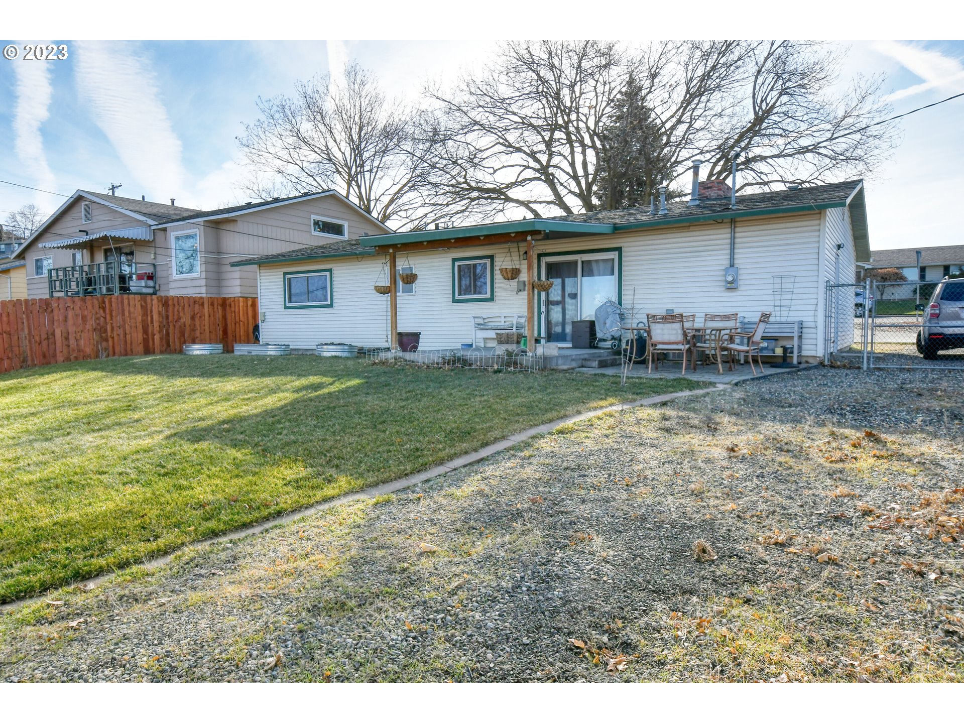 2437 Southwest Ladow Avenue Pendleton, OR 97801 - Photo 30 of 32 a view of a house with backyard and tree