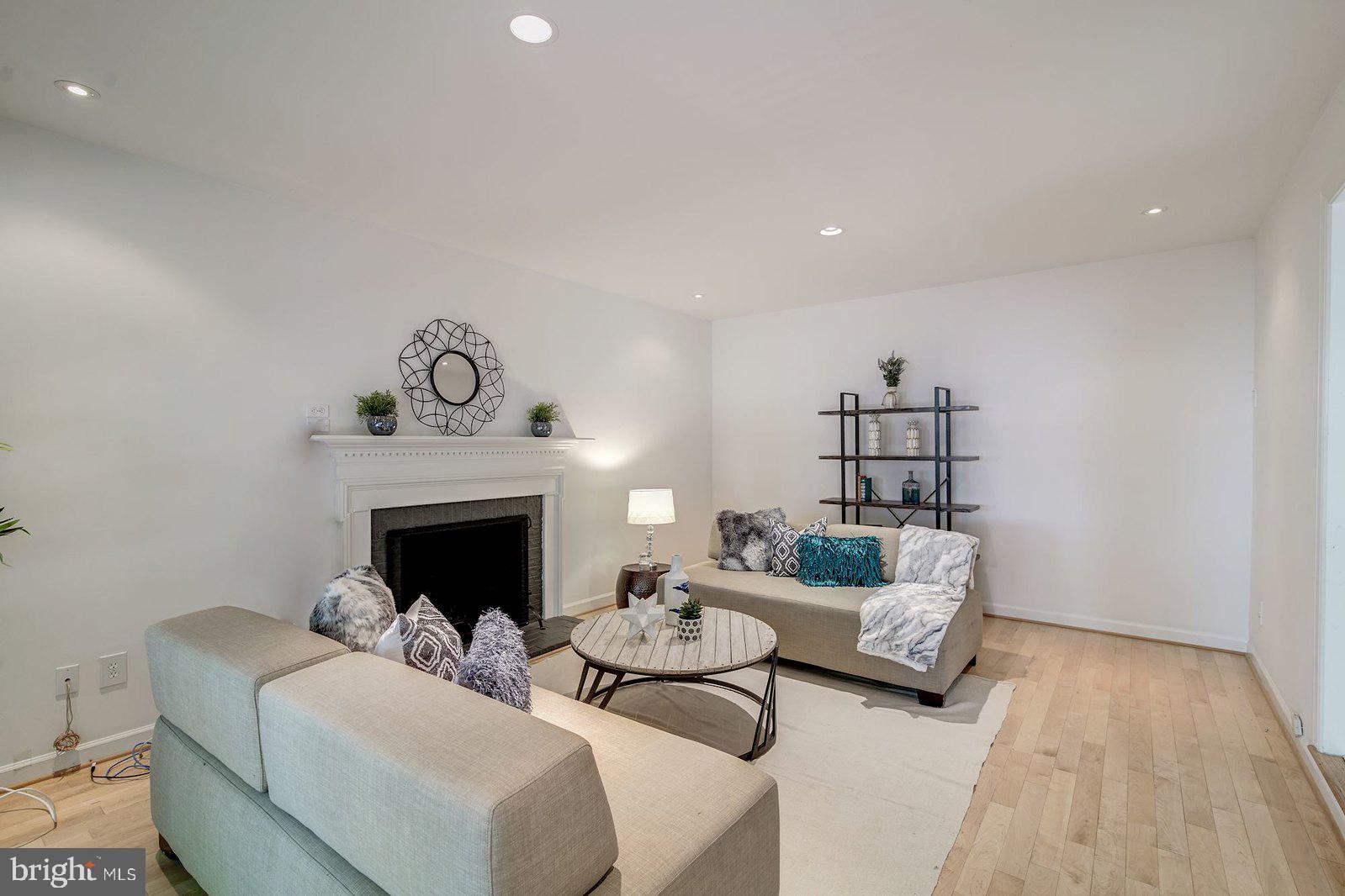 2064 Madrillon Road Vienna, VA 22182 - Photo 40 of 68 Family room with a fireplace