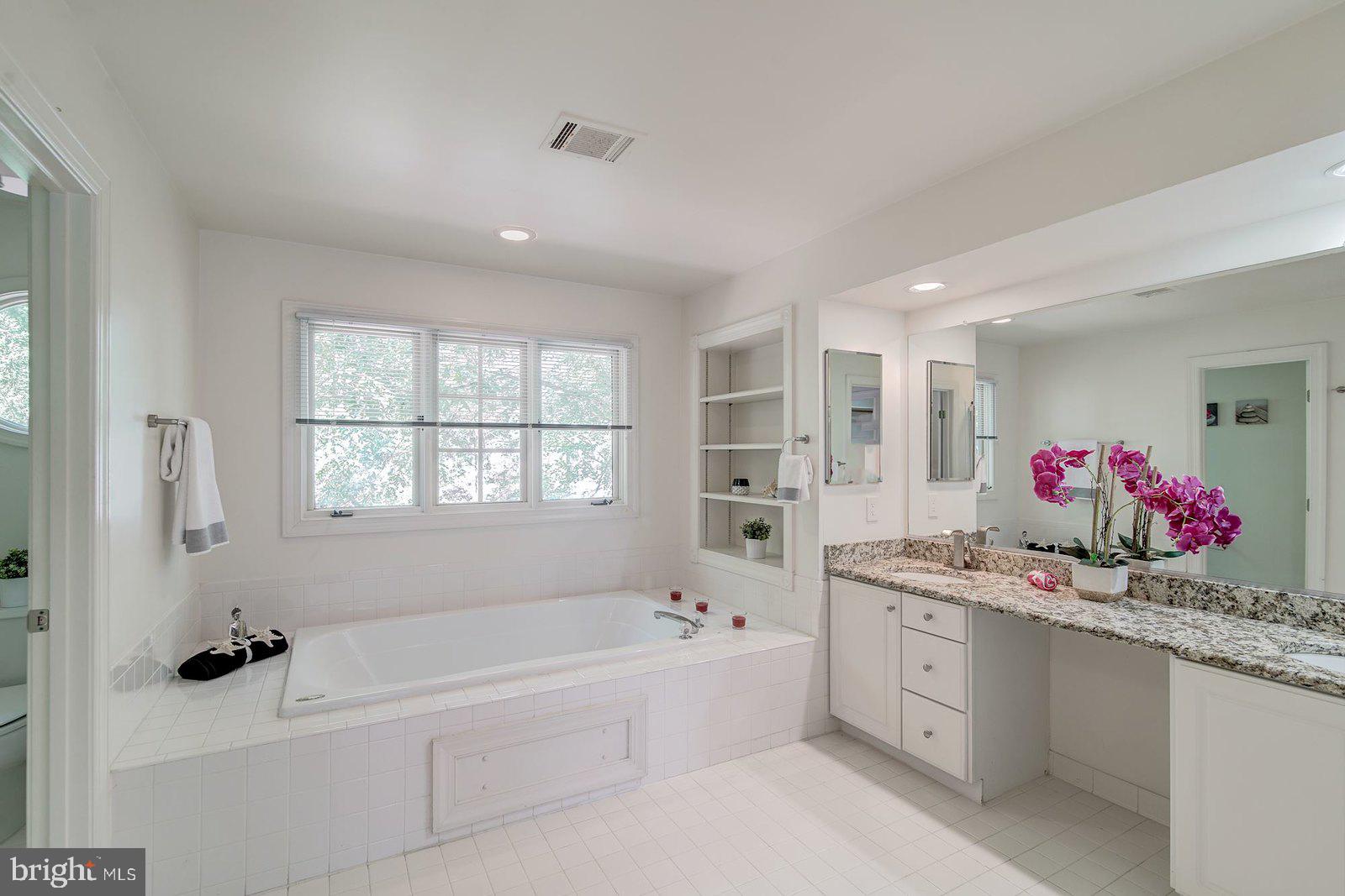2064 Madrillon Road Vienna, VA 22182 - Photo 51 of 68 Master Bath with a separate jacuzzi tub
