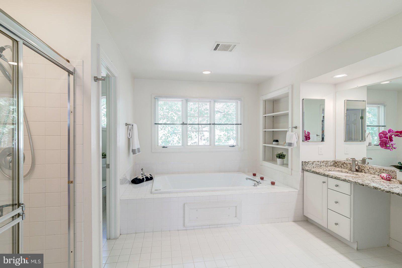 2064 Madrillon Road Vienna, VA 22182 - Photo 52 of 68 Master Bath with a separate jacuzzi tub