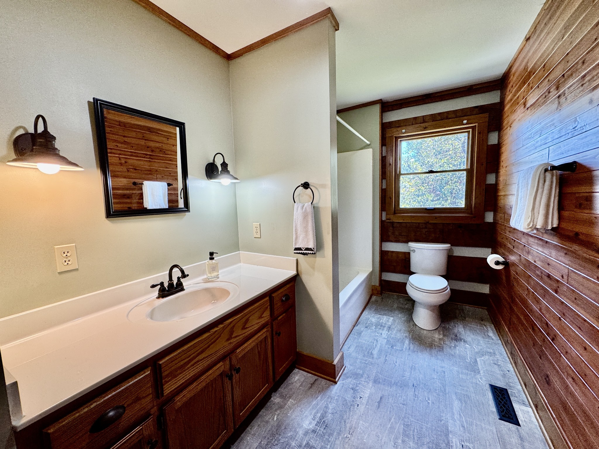1342 Aetna Church Road Centerville, TN 37033 - Photo 26 of 59 a spacious bathroom with a double vanity sink toilet and a tub