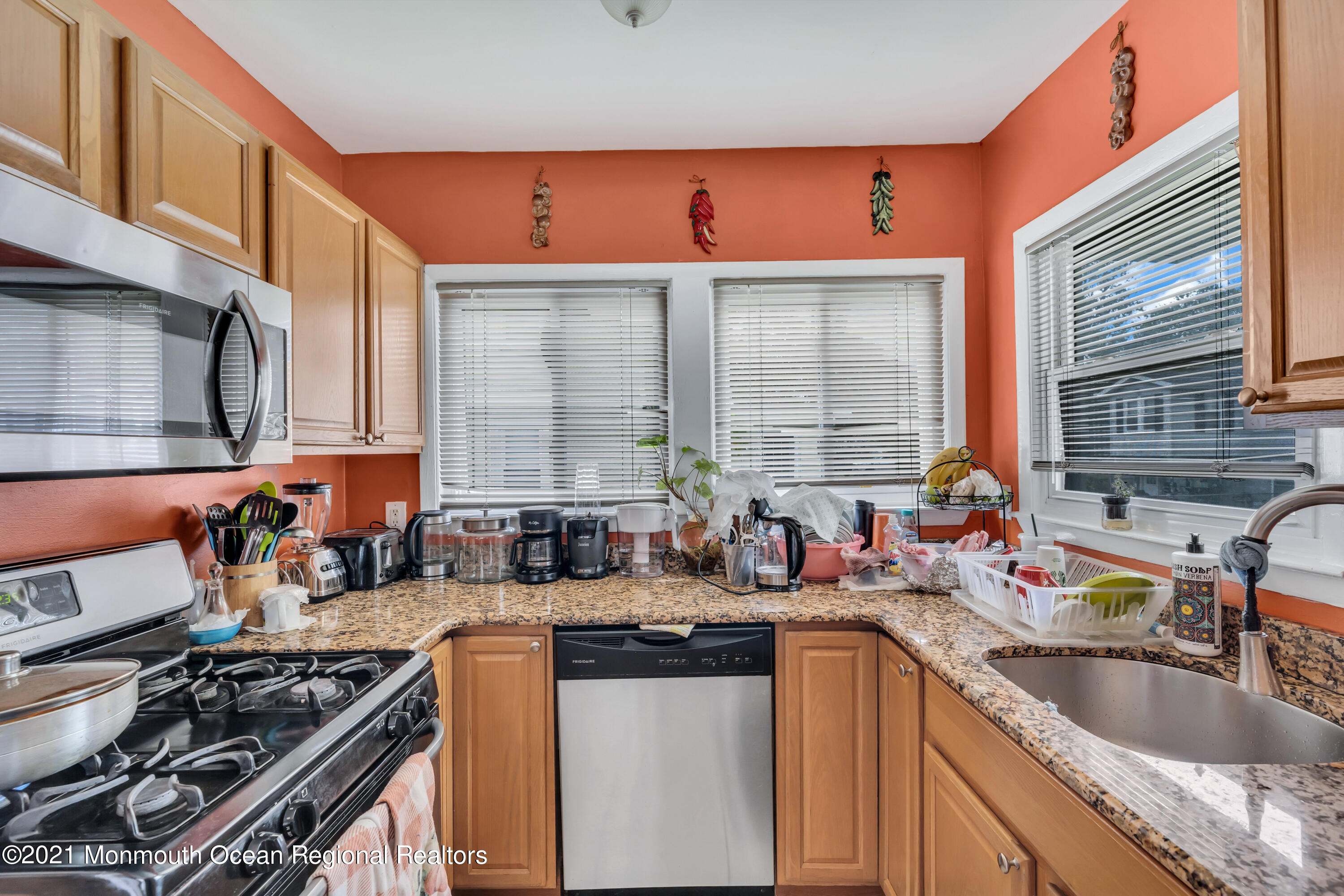 1209 7th Avenue, Unit 1/2 Neptune Township, NJ 07753 - Photo 11 of 19 a kitchen that has a sink and a stove